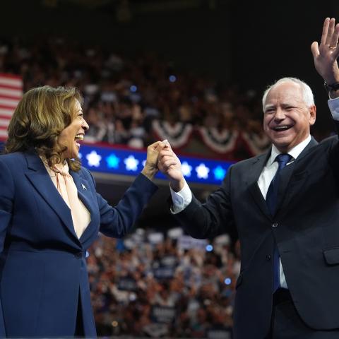 Kamala Harris and Gov. Tim Walz greet supporters during a campaign event on August 6, 2024, in Philadelphia, Pennsylvania. (Andrew Harnik via Getty Images)