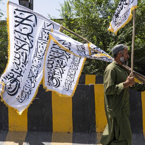 An Afghan man sells Taliban flags in Kabul, Afghanistan, on August 13, 2024. (Wakil Kohsar/AFP via Getty Images)