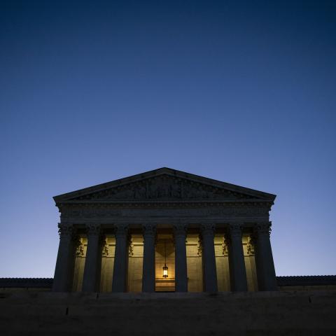 The US Supreme Court building illuminated against a blue sky in Washington, DC. (Bloomberg via Getty Images)