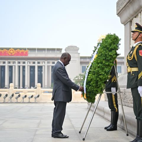Solomon Islands' Prime Minister Jeremiah Manele lays a wreath at the Monument to the People's Heroes on the Tian'anmen Square in Beijing, capital of China, July 11, 2024. (Li Xiang/Xinhua via Getty Images)