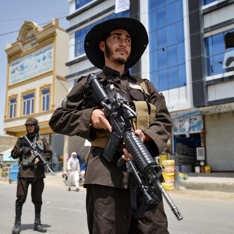 Taliban security personnel stand guard at a checkpoint in Kandahar, Afghanistan, on the eve of the third anniversary of the Taliban's takeover of Afghanistan on August 13, 2024. (Sanaullah Seiam/AFP via Getty Images)
