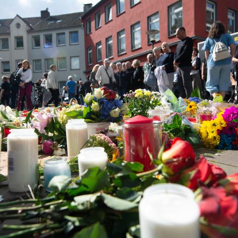 A memorial is set near the entrance of the attack site and in front of Solingen City Church for locals who can bring flowers and candles and write messages after the Solingen attack that kills three people in Solingen, Germany, on August 26, 2024. (Photo by Ying Tang/NurPhoto via Getty Images)