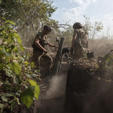 Ukrainian soldiers fire a mortar in the direction of Kreminna, Ukraine, on August 26, 2024. (Diego Herrera Carcedo/Anadolu via Getty Images)