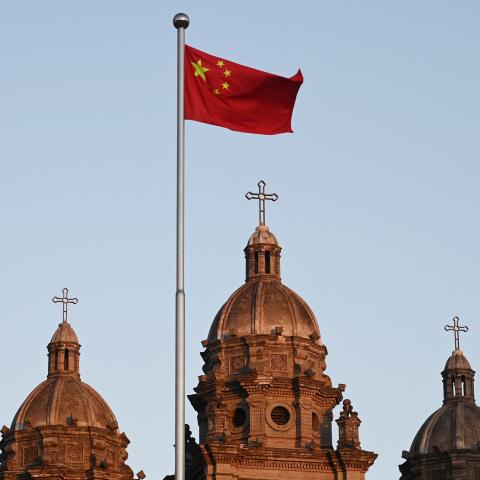 The Chinese national flag flies in front of St Joseph’s Church, also known as Wangfujing Catholic Church, in Beijing on October 22, 2020. (Greg Baker via Getty Images)
