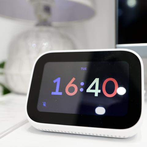 The Mi Smart Clock, a smart clock by Xiaomi that works as an artificial intelligence assistant with Google Assistant, as a speaker, and as a security device together with the Xiaomi Smart Camera c400, is being exhibited in the Xiaomi smart home display during the Mobile World Congress 2023 on March 2, 2023, in Barcelona, Spain. (Photo by Joan Cros/NurPhoto via Getty Images)