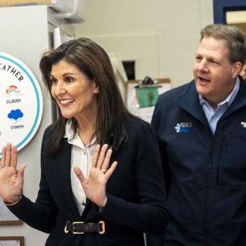 With New Hampshire Governor Chris Sununu by her side, Republican presidential candidate Nikki Haley visits a first grade class in Manchester, New Hampshire, on Friday January 19, 2024. (Melina Mara/The Washington Post via Getty Images)