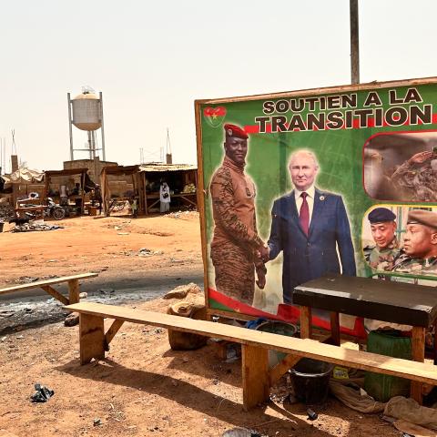 Russia's President Putin and Burkina Faso's interim military president Traoré can be seen together on a poster with the slogan "Support for the transition" in Ouagadougou, Burkina Faso, on March 5, 2024. (Christina Peters/picture alliance via Getty Images)