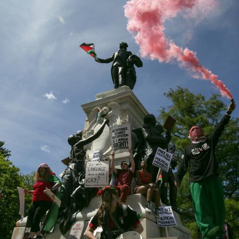 Pro-Palestinian demonstrators leave Palestinian flags and graffiti on the Rochambeau Statue in Lafayette Park next to the White House on June 8, 2024. (Probal Rashid/LightRocket via Getty Images)