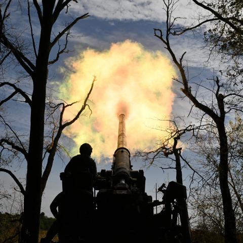 Ukrainian servicemen fire a 2S7 Pion self-propelled cannon towards Russian positions in the Donetsk region on September 27, 2024. (Genya Savilov/AFP via Getty Images)