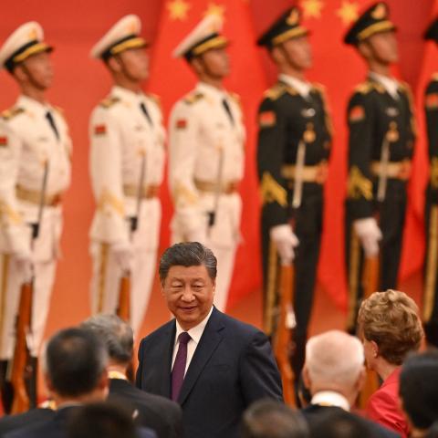 China's President Xi Jinping walks after delivering a speech in Beijing on September 29, 2024. (Adek Berry/AFP via Getty Images)