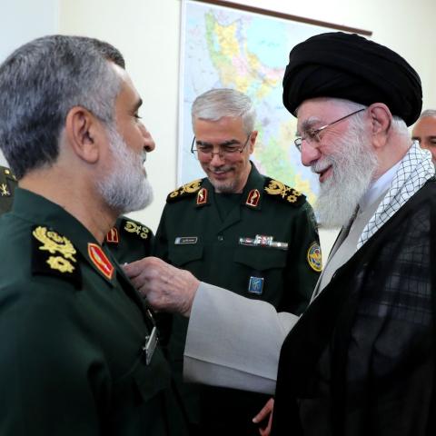 Iranian Supreme Leader Ayatollah Ali Khamenei awards the Order of Fat'h to Amir Ali Hajizadeh in Tehran, Iran, on October 6, 2024. (Iranian Leader Press Office/Anadolu via Getty Images)