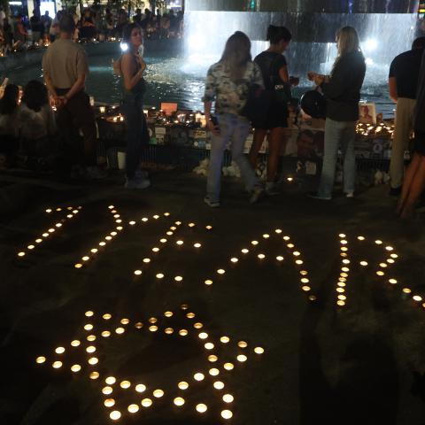 People gather to mark the first anniversary of the October 7 attacks in Tel Aviv on October 7, 2024. (Gil Cohen-Magen/AFP via Getty Images)