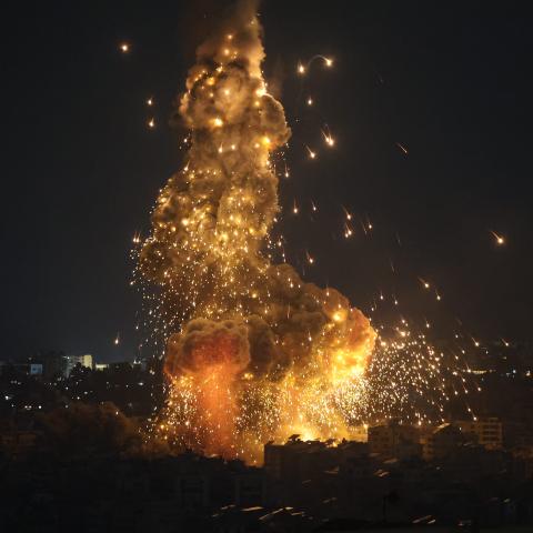 Explosions erupt as Israeli forces shell buildings in Lebanon on October 6, 2024, in Beirut, Lebanon. (Ugur Yildirim images via Getty Images)