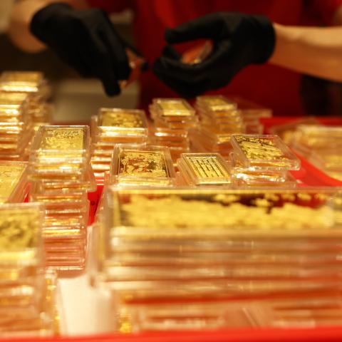 Gold bars are on display at a gold jewelry store on October 18, 2024, in Hangzhou, China. (Ni Lifang/VCG via Getty Images)