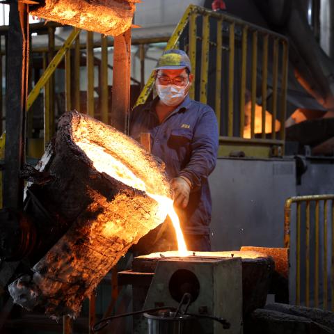 A worker produces wear-resistant rings for export to European and American markets in a workshop on October 14, 2024, in Binzhou City, China. (CFOTO/Future Publishing via Getty Images)