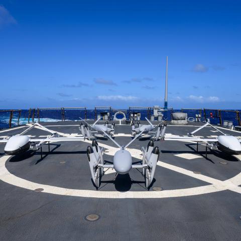 Uncrewed aerial systems from Skyways and PteroDynamics sit on the flight deck of the guidedmissile destroyer USS Curtis Wilbur (DDG 54) on June 25, 2024. (US Navy)