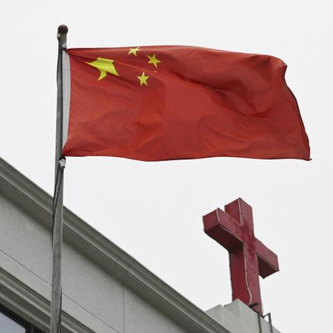 This photo taken on January 15, 2024, shows a Chinese flag fluttering on a Christian church in Pingtan, China. (Greg Baker/AFP via Getty Images)