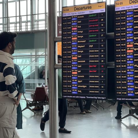A passenger is looking at the flight board at Kempegowda International Airport in Bengaluru (Bangalore), Karnataka, India, on April 17, 2024. Kempegowda Airport is the third-busiest airport by passenger traffic in the country, behind the airports in Delhi and Mumbai, and is the 34th busiest airport in Asia. (Photo by Creative Touch Imaging Ltd./NurPhoto via Getty Images)