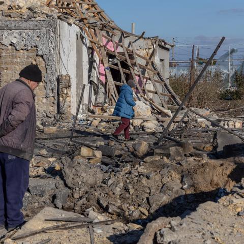 A local resident stands outside of a destroyed building following a missile attack in Odesa, Ukraine, on November 17, 2024. (Oleksandr Gimanov/AFP via Getty Images)