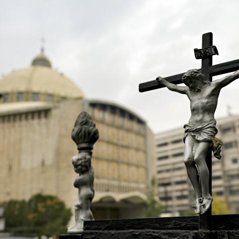A crucifix is pictured outside the Syriac Catholic Cathedral of Our Lady of the Assumption in Aleppo, Syria, on December 12, 2024. (Ozan Kose/AFP via Getty Images)