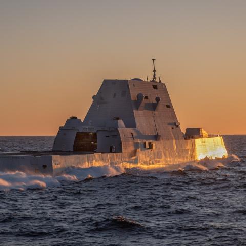  (February 10, 2024) — The Zumwalt Class Guided Missile Destroyer USS Michael Monsoor (DDG 1001) breaks away from the Henry J. Kaiser-class fleet replenishment oiler USNS Pecos (T-AO 197) shortly before sunset after taking on fuel. (U.S. Navy photo by Chief Mass Communication Specialist Mark D. Faram)