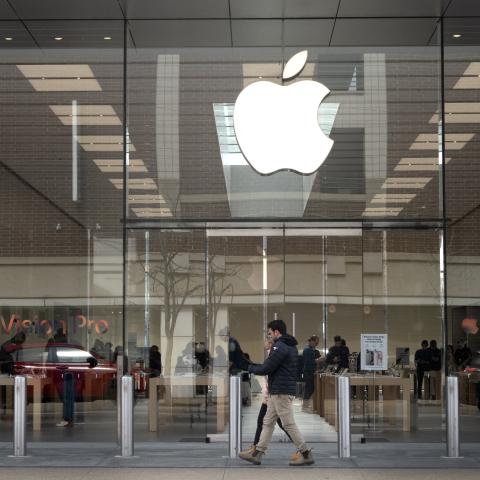 The Apple logo hangs in front of an Apple store on March 21, 2024, in Chicago, Illinois. (Scott Olson via Getty Images)