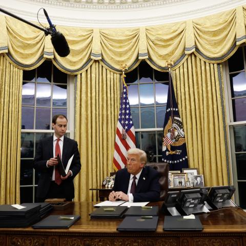 President Donald Trump speaks to reporters after signing a series of executive orders in the White House. (Anna Moneymaker via Getty Images)