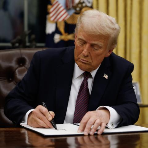 President Donald Trump signs executive orders in the Oval Office of the White House on January 20, 2025. (Anna Moneymaker via Getty Images)