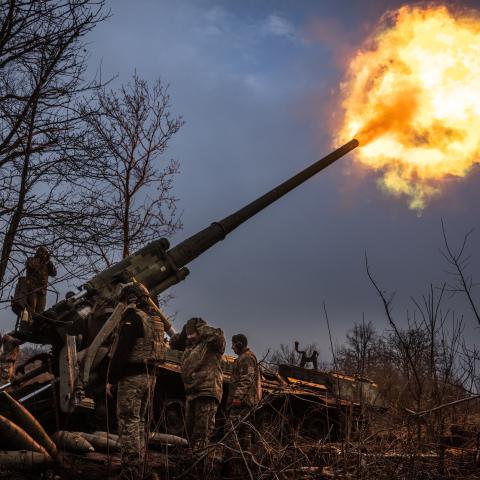 Ukrainian soldiers work on a Soviet era Pion self propelled howitzer in the direction of Chasiv Yar, Ukraine, on January 27, 2025. (Wolfgang Schwan/Anadolu via Getty Images)