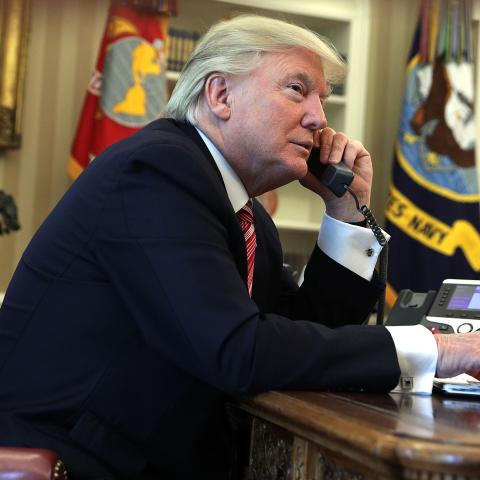 President Donald Trump speaks on the phone with Irish Prime Minister Leo Varadkar on June 27, 2017, in Washington, DC. (Alex Wong via Getty Images)