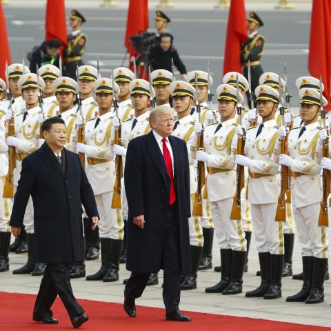 United States President Donald Trump takes part in a welcoming ceremony with Chinese President Xi Jinping on November 9, 2017, in Beijing, China. (Thomas Peter via Getty Images)
