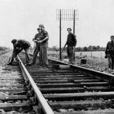 French Resistance fighters sabotaging a railway in Saône-et-Loire in September 1944. (Roger Viollet via Getty Images)