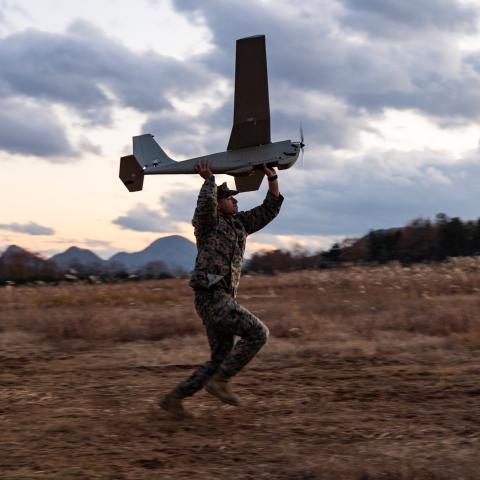 U.S. Marine Corps Cpl. Jakob Santos, a small unmanned aerial system operator with 4th Marines, 3d Marine Division, prepares to launch a RQ-20B Puma during Artillery Relocation Training Program 24.3 at Ojojihara Maneuver Area, Miyagi Prefecture, Japan, Nov. 29, 2024. Unmanned aircraft provide enhanced situational awareness, quick resupply capabilities, and reduce the footprint of military personnel. The skills developed at ARTP increase the proficiency and readiness of the only permanently forward-deployed a