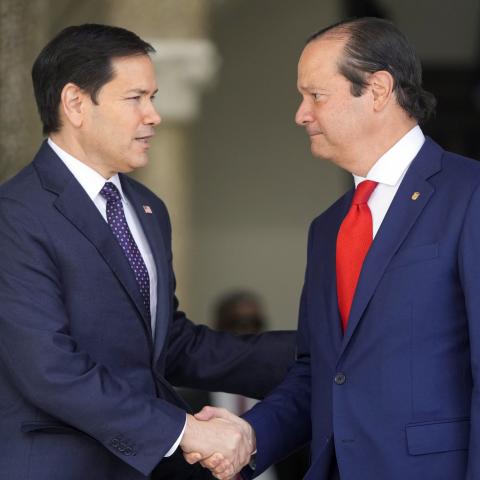 Panama's Foreign Minister Javier Martinez-Acha shakes hands with US Secretary of State Marco Rubio at the presidential palace on February 2, 2025, in Panama City. (MARK SCHIEFELBEIN/POOL/AFP via Getty Images) 