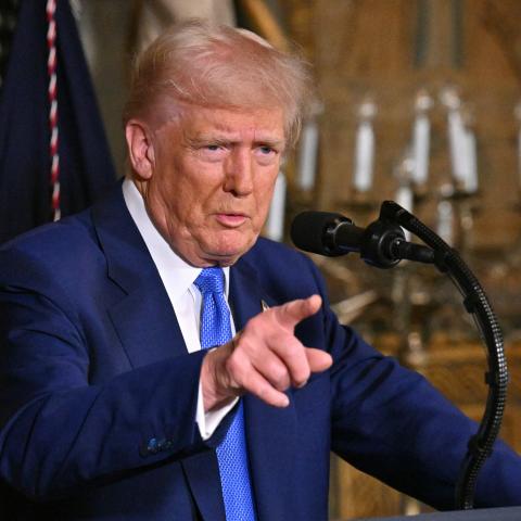 US President Donald Trump speaks during signing of executive orders at his Mar-a-Lago resort in Palm Beach, Florida, on February 18, 2025. (Photo by ROBERTO SCHMIDT / AFP) (Photo by ROBERTO SCHMIDT/AFP via Getty Images)