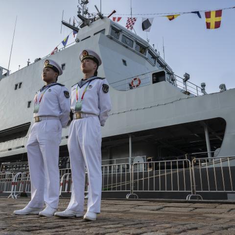 Chinese sailors stand next to a submarine rescue ship Hongzehu from the PLA Navy as it is docked on April 23, 2024, in Qingdao, China.(Kevin Frayer via Getty Images)