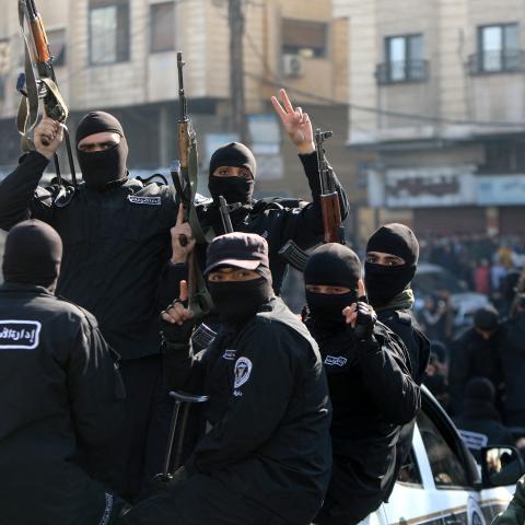 Security forces reporting to Syria's transitional government patrol the streets of Dummar, during an operation to seize weapons and hunt down armed supporters of the ousted Assad leadership on January 15, 2025. (Bakr Alkasem/AFP via Getty Images)