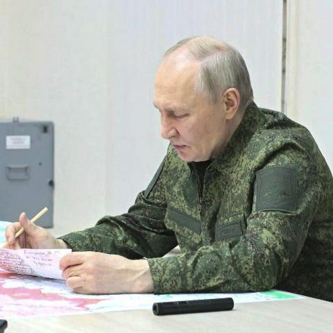 A screen grab from a video shows Russian President Vladimir Putin, dressed in military uniform, visiting a command post in Kursk, Russia, on March 12, 2025. (Kremlin Press Office via Getty Images)