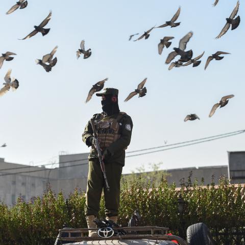 A Taliban security personnel stands guard outside the Shah-Do Shamshira Mosque during Eid al-Fitr prayers, which marks the end of the holy fasting month of Ramadan in Kabul on March 30, 2025. (Photo by Ahmad SAHEL ARMAN / AFP) (Photo by AHMAD SAHEL ARMAN/AFP via Getty Images)