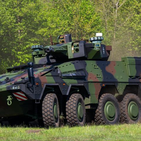 A Boxer wheeled armored infantry vehicle of the German armed forces drives across the Rheinmetall site. The Rheinmetall armaments group has been commissioned to supply the 123 Boxer vehicles with 123 Boxer vehicles with 30mm automatic cannon. Photo: Philipp Schulze/dpa (Photo by Philipp Schulze/picture alliance via Getty Images)