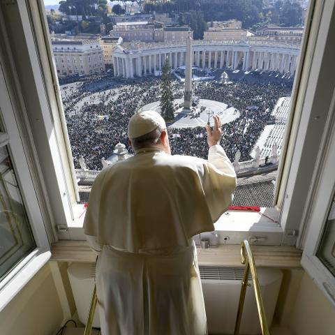 Pope Francis waves to the faithful gathered in St. Peter’s Square during his Sunday Angelus blessing on the World Youth Day on November 24, 2024, in Vatican City. (Getty Images)