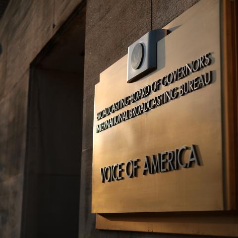The Voice of America (VOA) sign is displayed on its building on March 17, 2025, in Washington, DC. (Alex Wong via Getty Images)