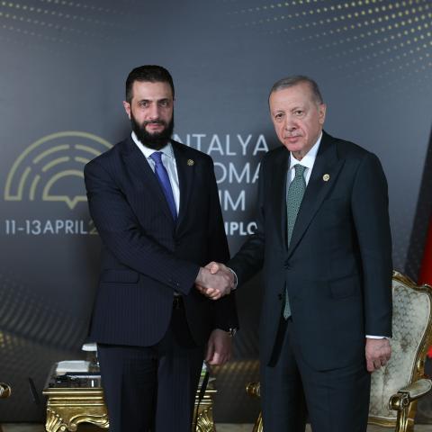 Turkish President Recep Tayyip Erdogan and Syrian President Ahmed al-Shara meet during the fourth edition of the Antalya Diplomacy Forum in Antalya, Türkiye, on April 11, 2025. (Turkish Presidency via Getty Images)