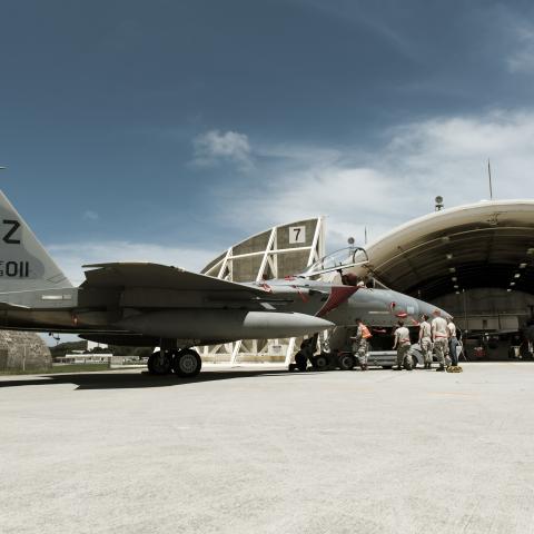  Airmen store an F-15C Eagle in a hardened aircraft shelter in preparation for Typhoon Maria on July 9, 2018, at Kadena Air Base, Japan. (DVIDS)