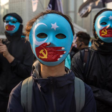 Protesters attend a rally in Hong Kong on December 22, 2019, to show support for the Uyghur minority in China. Dale DE LA REY / AFP via Getty Images)