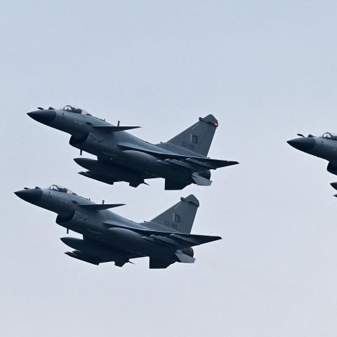 Chinese-made Pakistan Air Force J-10C fighter jets perform at a rehearsal ahead of Pakistan’s national day parade in Islamabad on March 21, 2024. (Getty Images)