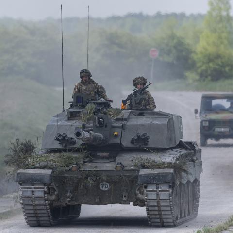 Soldiers drive a British Challenger battle tank as they take part in an urban combat exercise during a United Kingdom–French joint military maneuver near Reims, France, on April 22, 2025. (Getty Images)
