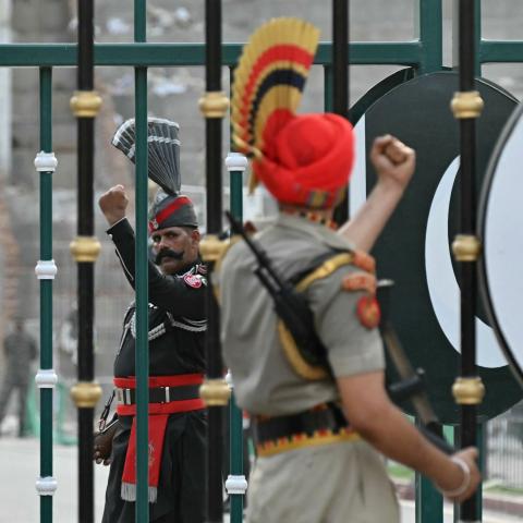 Pakistani ranger and Indian Border Security Force member on the outskirts of Amritsar, India, on May 20, 2025. (Narinder Nanu via Getty Images)