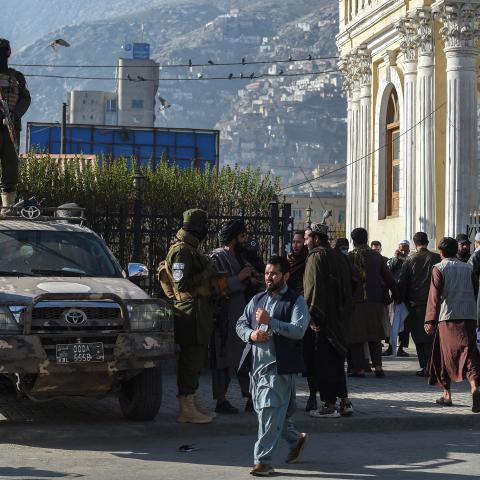 Taliban security personnel stand guard as Muslim devotees arrive in Kabul on March 30, 2025. (Ahmad Sahel Arman via Getty Images)