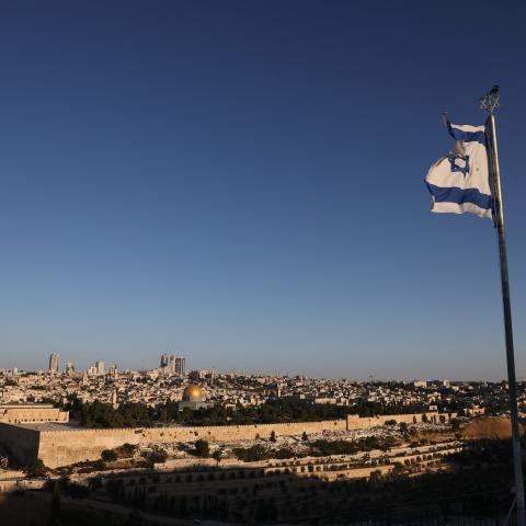 An Israeli flag flutters on the Mount of Olives in Jerusalem on June 13, 2025. (Getty Images)